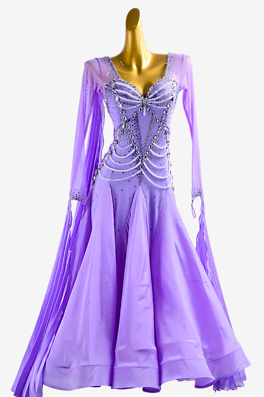Permino lilac Standard dress with mesh sleeves, pearl chiffon underskirts, pleated float, white crystals and beadings