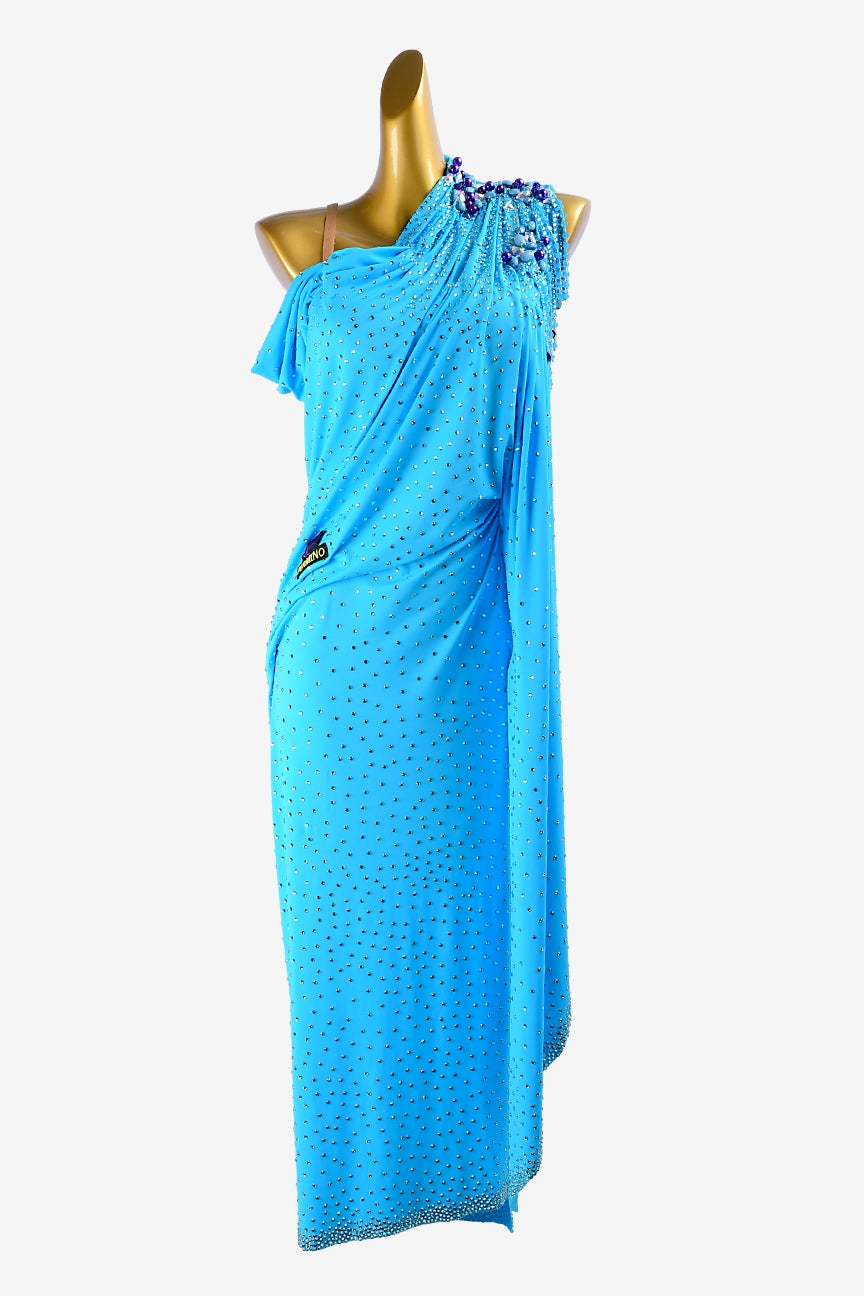 Permino turq matt lycra draping & ruching Latin dress with fleshtone body, beadings, rhinestones & sew-on stones