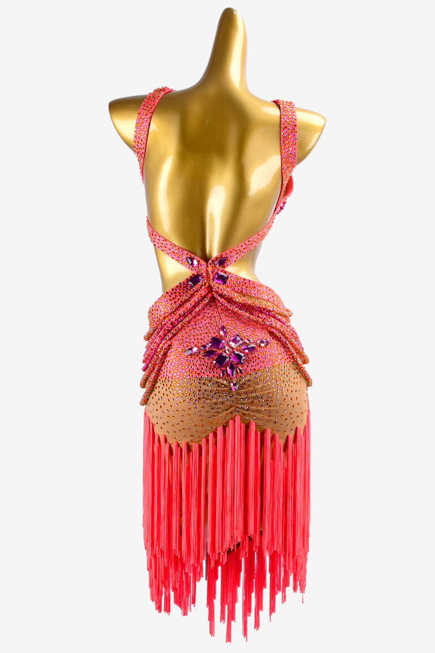 Permino fleshtone lycra Latin dress with oranger red stone string, fringes & rhinestones