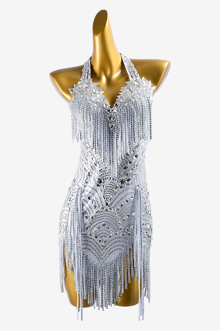 Permino silver metallic lycra Latin dress with lace appliqués, stone fringes white crystals & sew-on stones